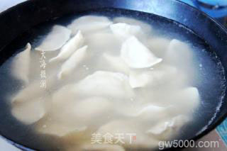 酸菜猪肉馅水饺的做法步骤：6